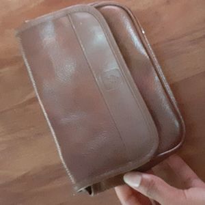 Brown Fleur de lis clutch